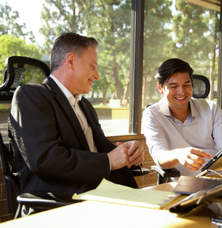 Male colleagues working in a conference room 