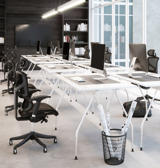 Modern white office room with Black X-Chairs around a table